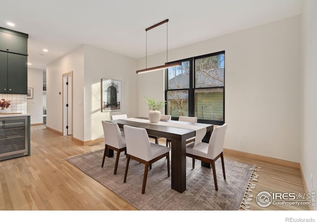 dining area with light wood-type flooring