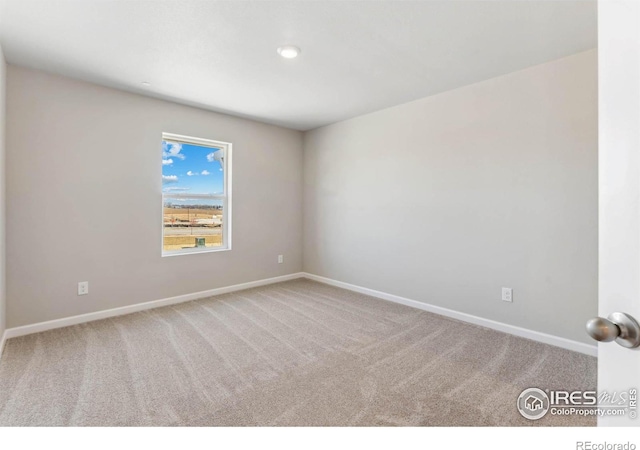 empty room featuring carpet floors