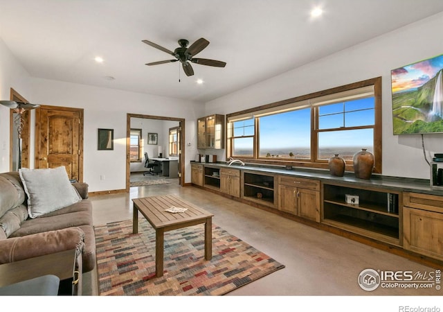 living room with ceiling fan