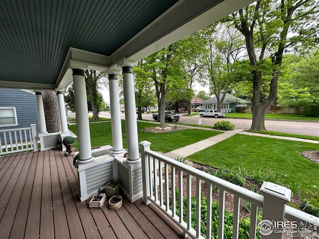 wooden terrace featuring a porch