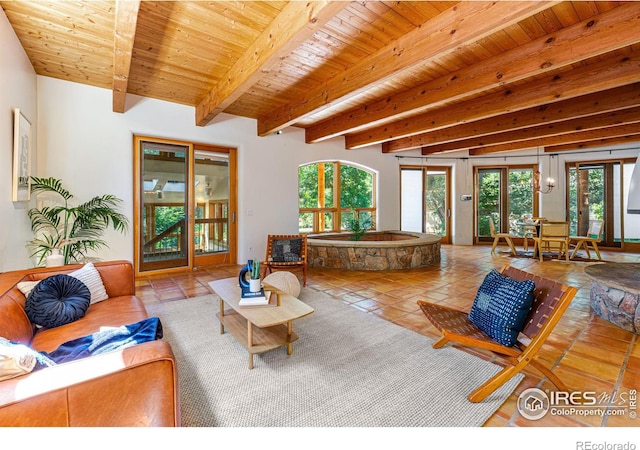 living room featuring beamed ceiling, wooden ceiling, tile patterned floors, and french doors