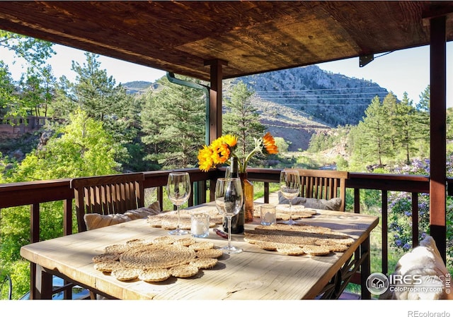 wooden terrace with a mountain view