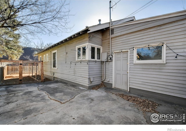 rear view of house with a patio