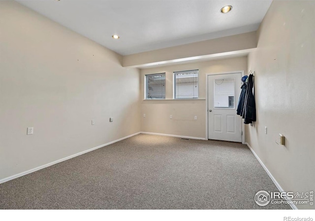 unfurnished bedroom featuring carpet