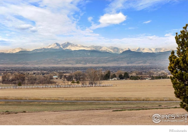 mountain view featuring a rural view