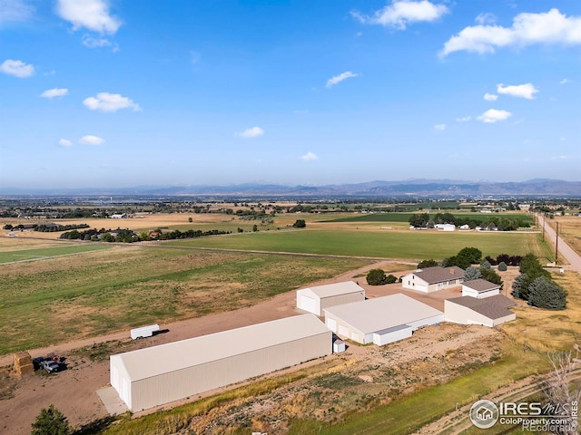 aerial view featuring a rural view and a mountain view