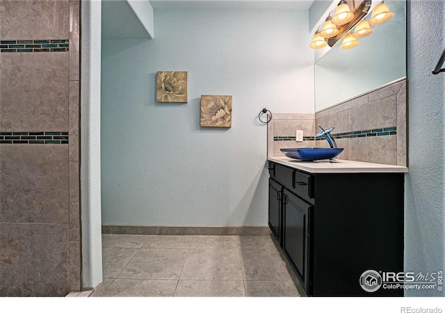 bathroom featuring vanity and tile patterned flooring