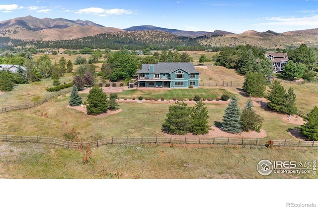 bird's eye view with a rural view and a mountain view