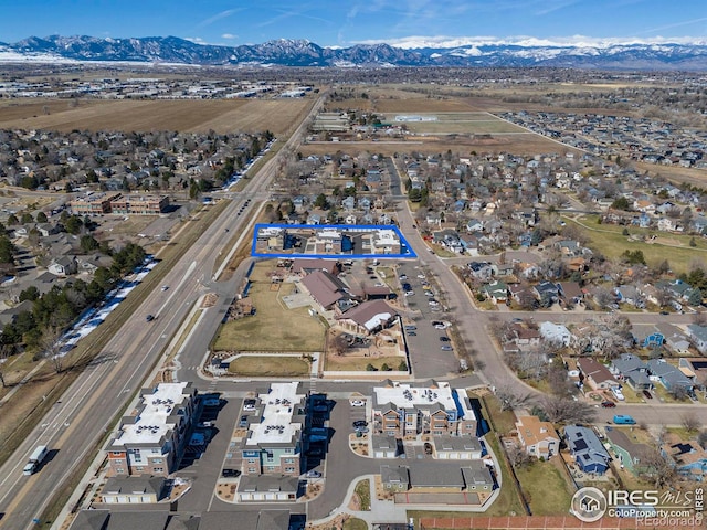 drone / aerial view featuring a mountain view