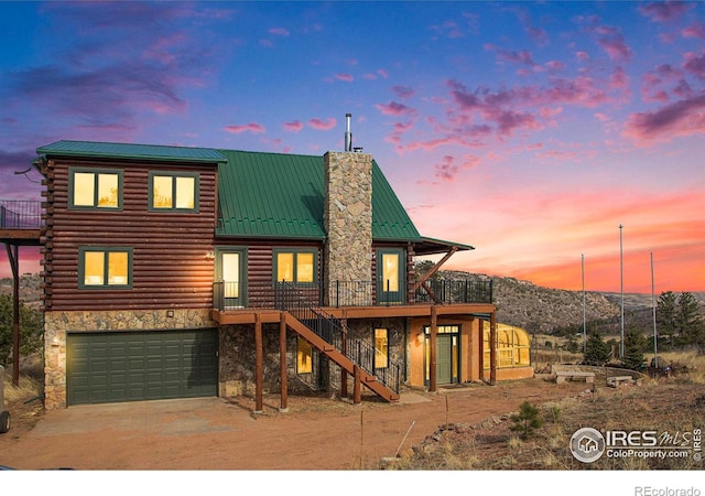 log home with a garage