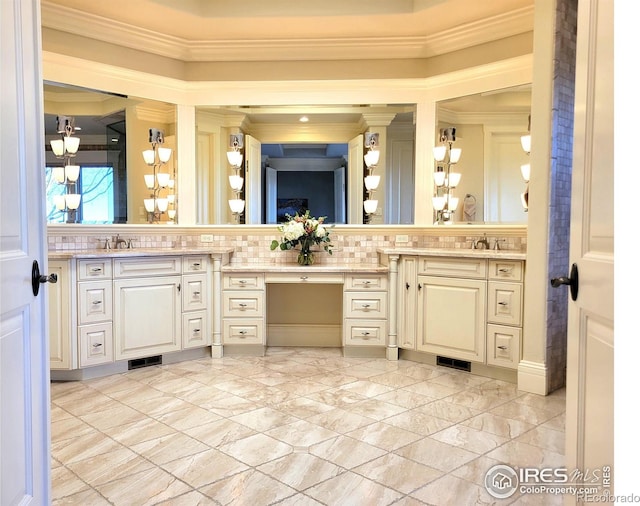 bathroom featuring tile patterned floors, tasteful backsplash, crown molding, and vanity