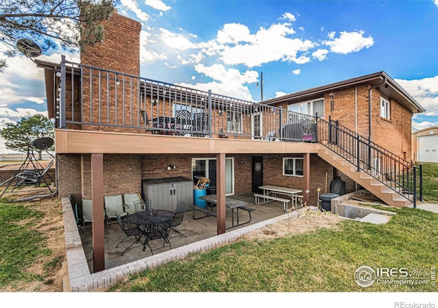 rear view of house with a patio