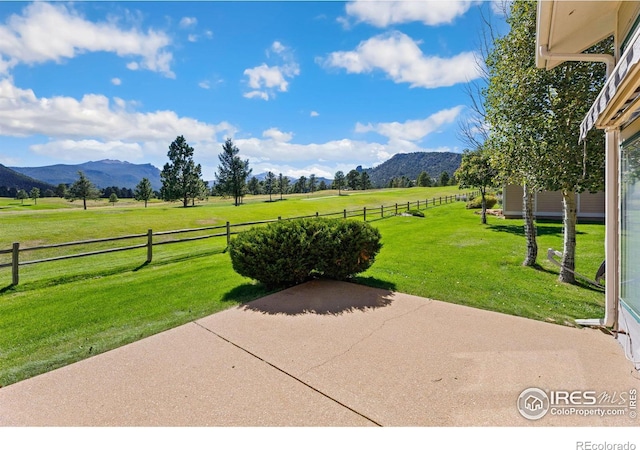 view of patio featuring a mountain view and a rural view