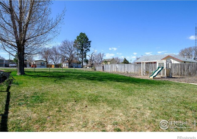 view of yard with a playground