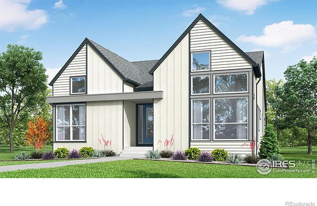 view of front of house with board and batten siding and a front yard