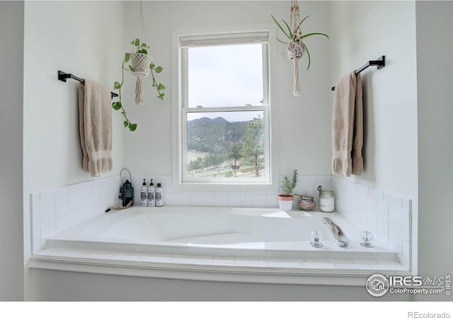 1553 Rowell Dr, Lyons, CO 80540 - full bathroom with plenty of natural light and a bath