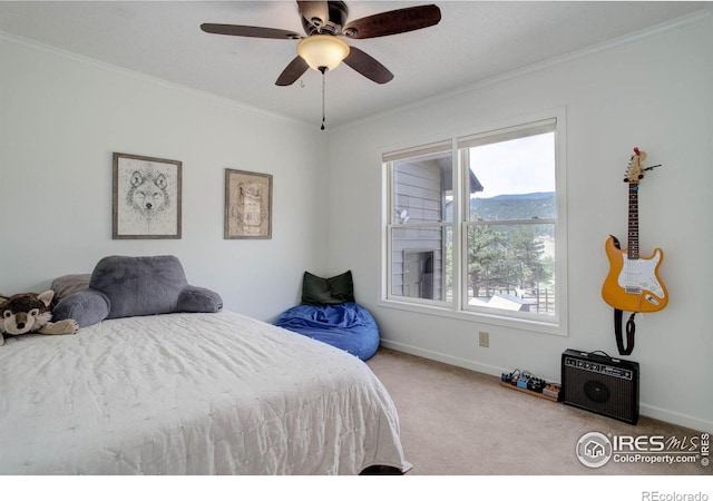 1553 Rowell Dr, Lyons, CO 80540 - carpeted bedroom with ornamental molding, baseboards, and a ceiling fan