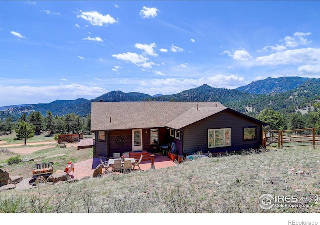 1553 Rowell Dr, Lyons, CO 80540 - view of front facade featuring a patio area and a mountain view