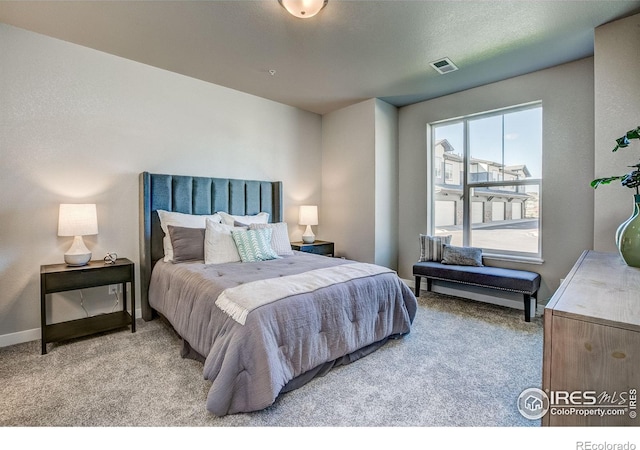 bedroom featuring carpet flooring