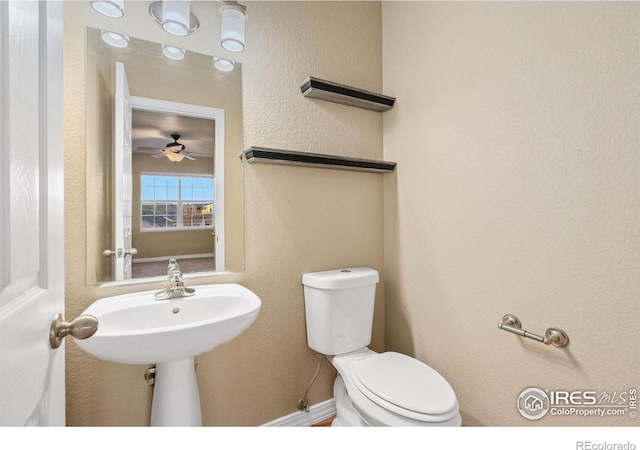 6925 19th St Unit 15, Greeley, CO 80634 - bathroom featuring ceiling fan and toilet