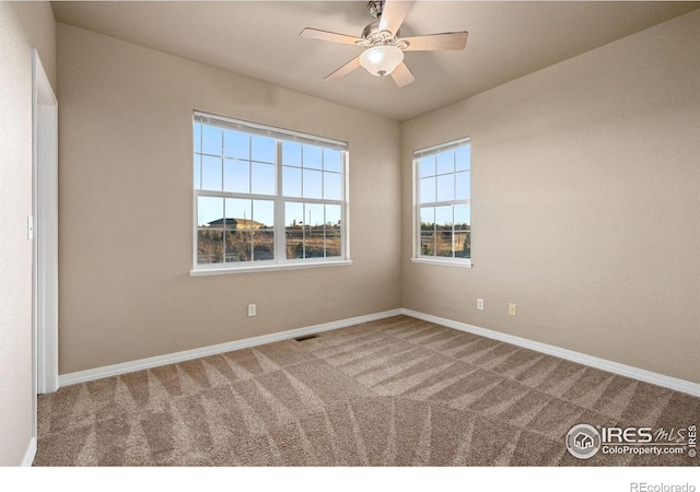 6925 19th St Unit 15, Greeley, CO 80634 - carpeted spare room featuring ceiling fan