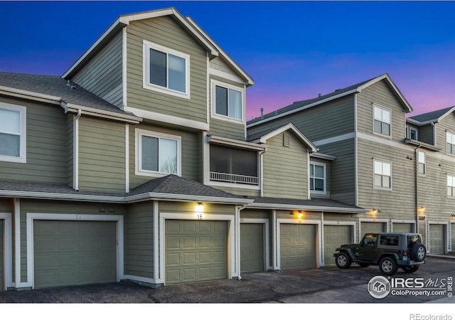 6925 19th St Unit 15, Greeley, CO 80634 - view of property featuring a garage