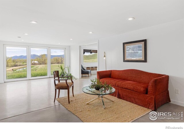 living room featuring a mountain view