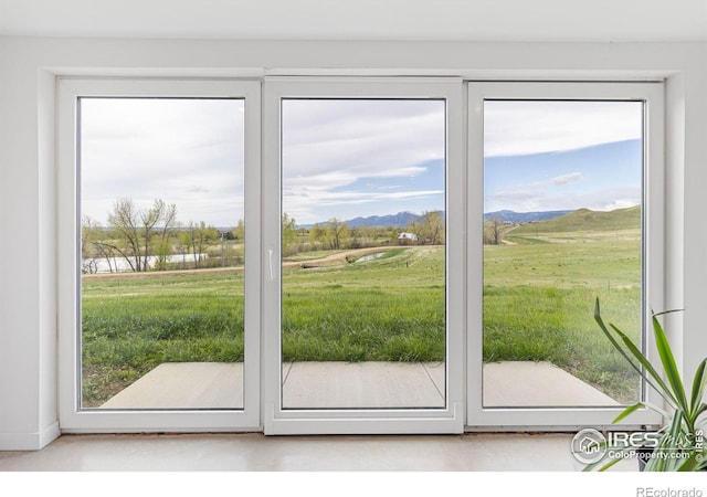 entryway featuring a rural view