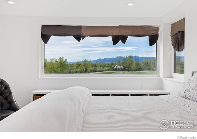 bedroom with a mountain view