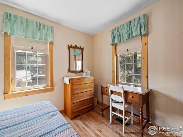 bedroom featuring light wood-type flooring