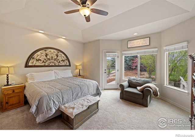 bedroom with access to outside, light carpet, and ceiling fan