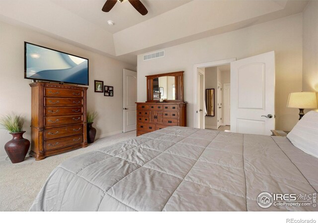 carpeted bedroom featuring ceiling fan