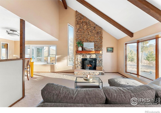 carpeted living room with high vaulted ceiling, beam ceiling, plenty of natural light, and a fireplace