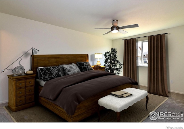 bedroom with ceiling fan and carpet