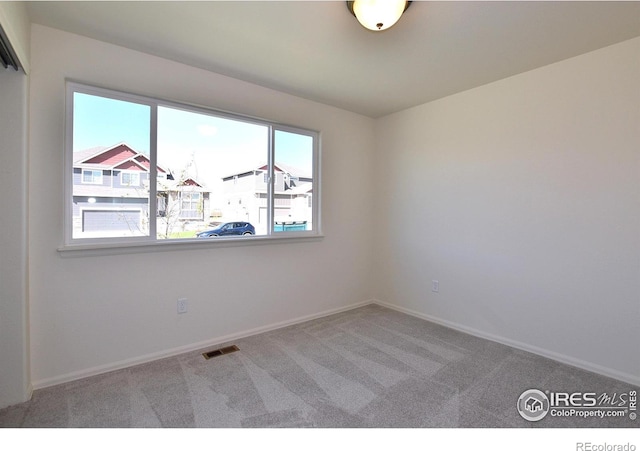 view of carpeted spare room