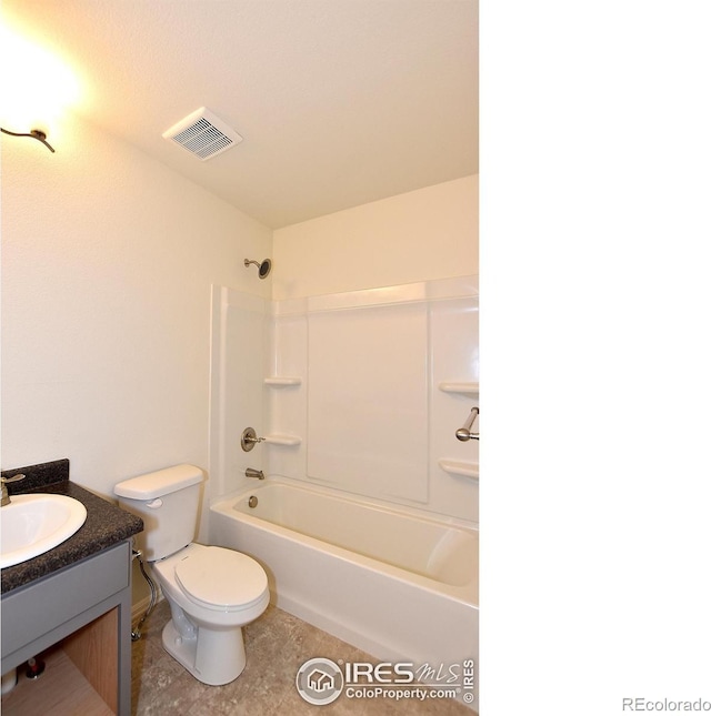 full bathroom with bathing tub / shower combination, vanity, and toilet