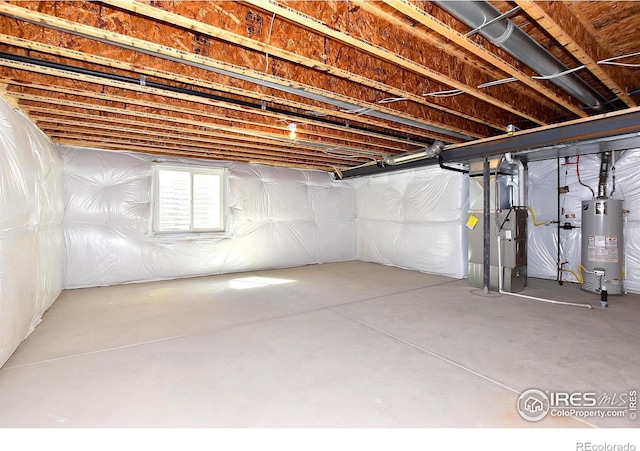 basement with heating unit and water heater