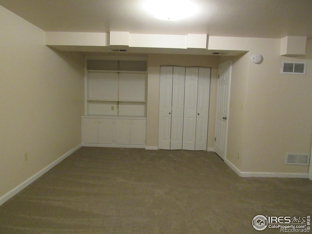 unfurnished bedroom featuring a closet and carpet floors