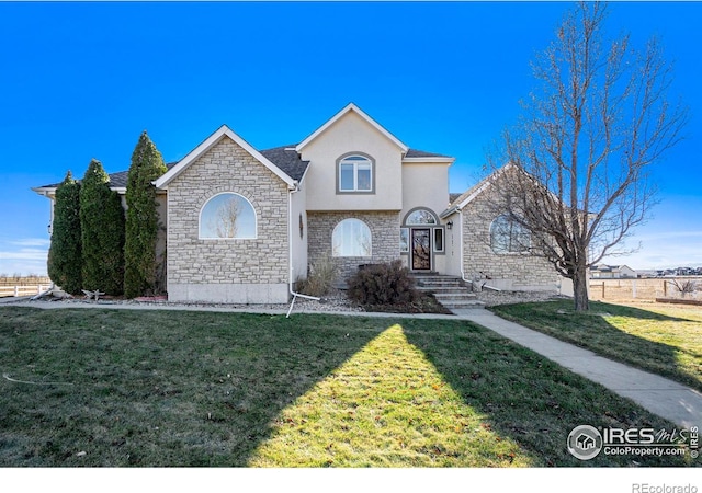 view of front property featuring a front lawn