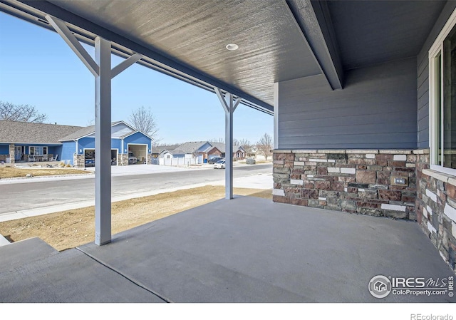 view of patio with a residential view