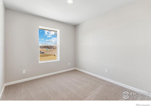 view of carpeted spare room