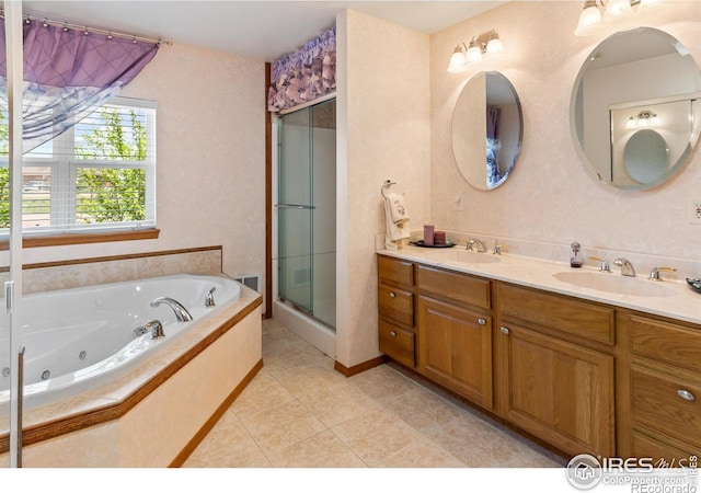 bathroom featuring tile patterned floors, vanity, and separate shower and tub