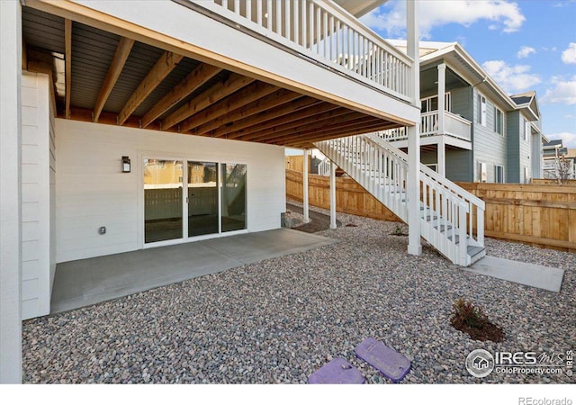 exterior space featuring a deck and a patio area