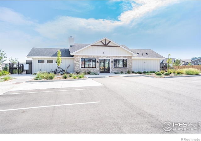 7173 Rye Grass Dr, Wellington, CO 80549 - view of building exterior featuring uncovered parking and fence