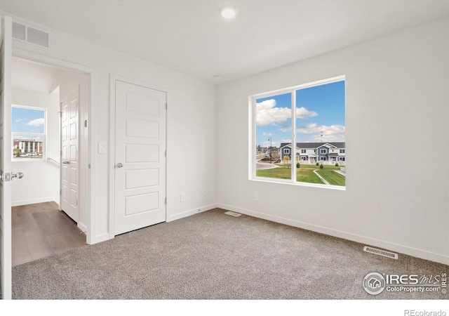 unfurnished bedroom featuring carpet floors