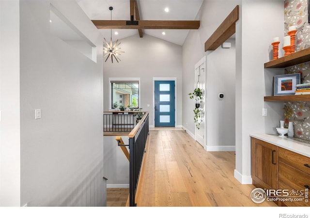 entryway featuring high vaulted ceiling, beamed ceiling, and light wood-type flooring