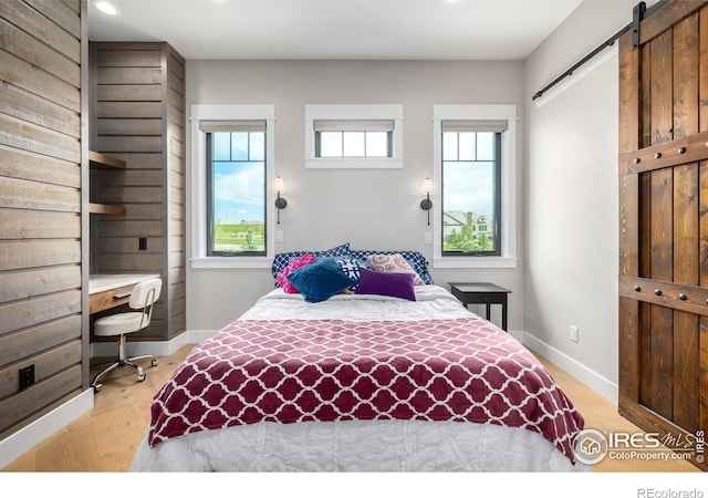 bedroom with a barn door