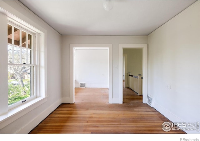 empty room with light wood-type flooring