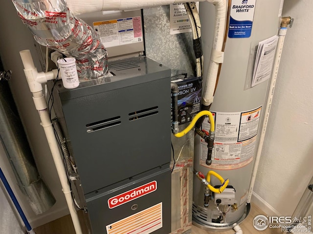 utilities featuring gas water heater and heating unit