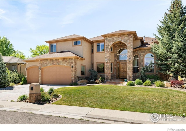 mediterranean / spanish-style house featuring a front lawn